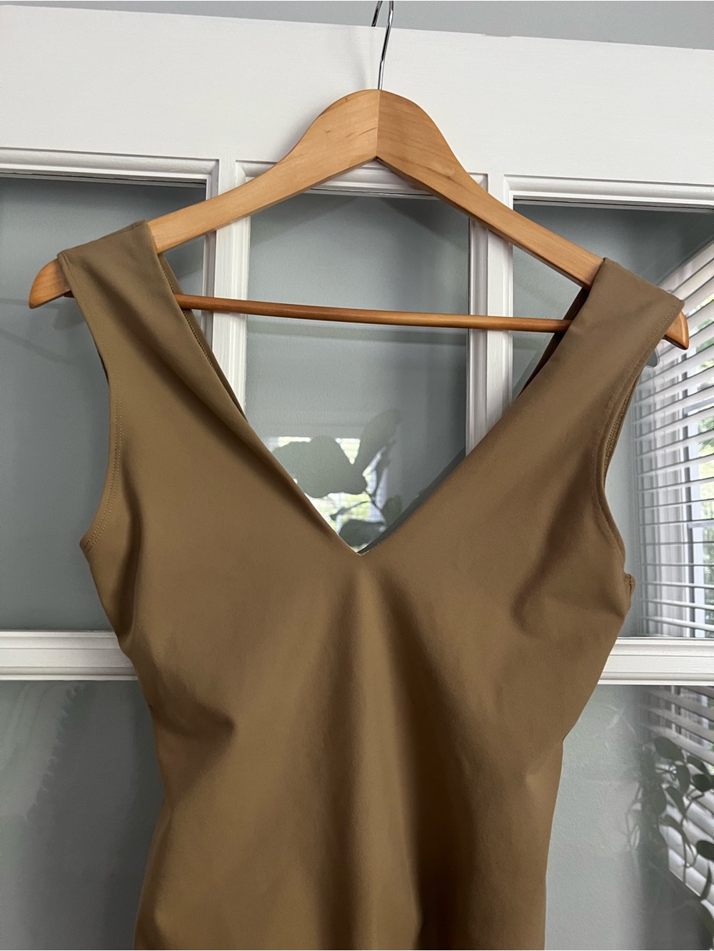 Sleeveless Tan V-Neck Asymmetric Bodysuit - Picture 2 of 7